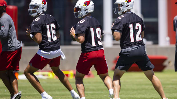 Arizona Cardinals quarterback Colt McCoy (12), Trace McSorley (19) and Jarrett Guarantano (16) during OTA workouts at the teams training facility. Mandatory Credit: Mark J. Rebilas-USA TODAY Sports